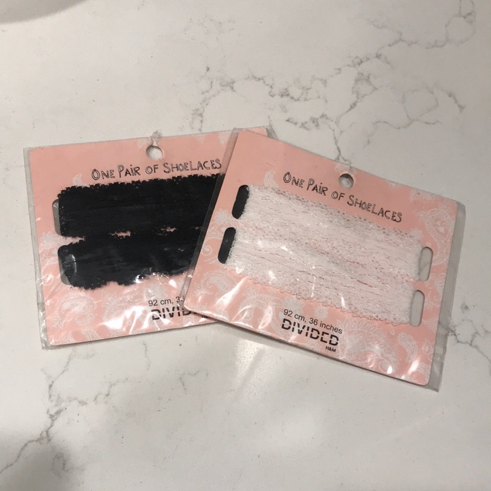 Bundle of black and white lace shoelaces